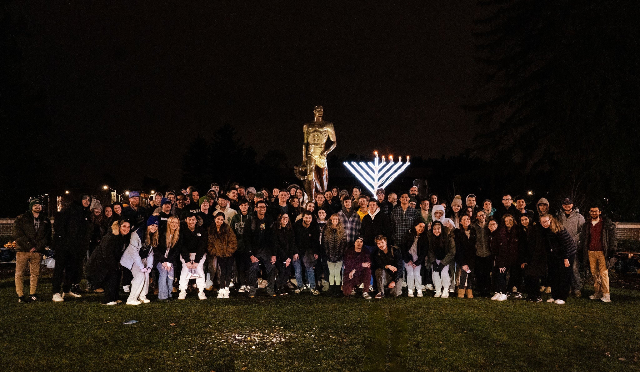 Jewish Spartans together at a campus menorah lighting